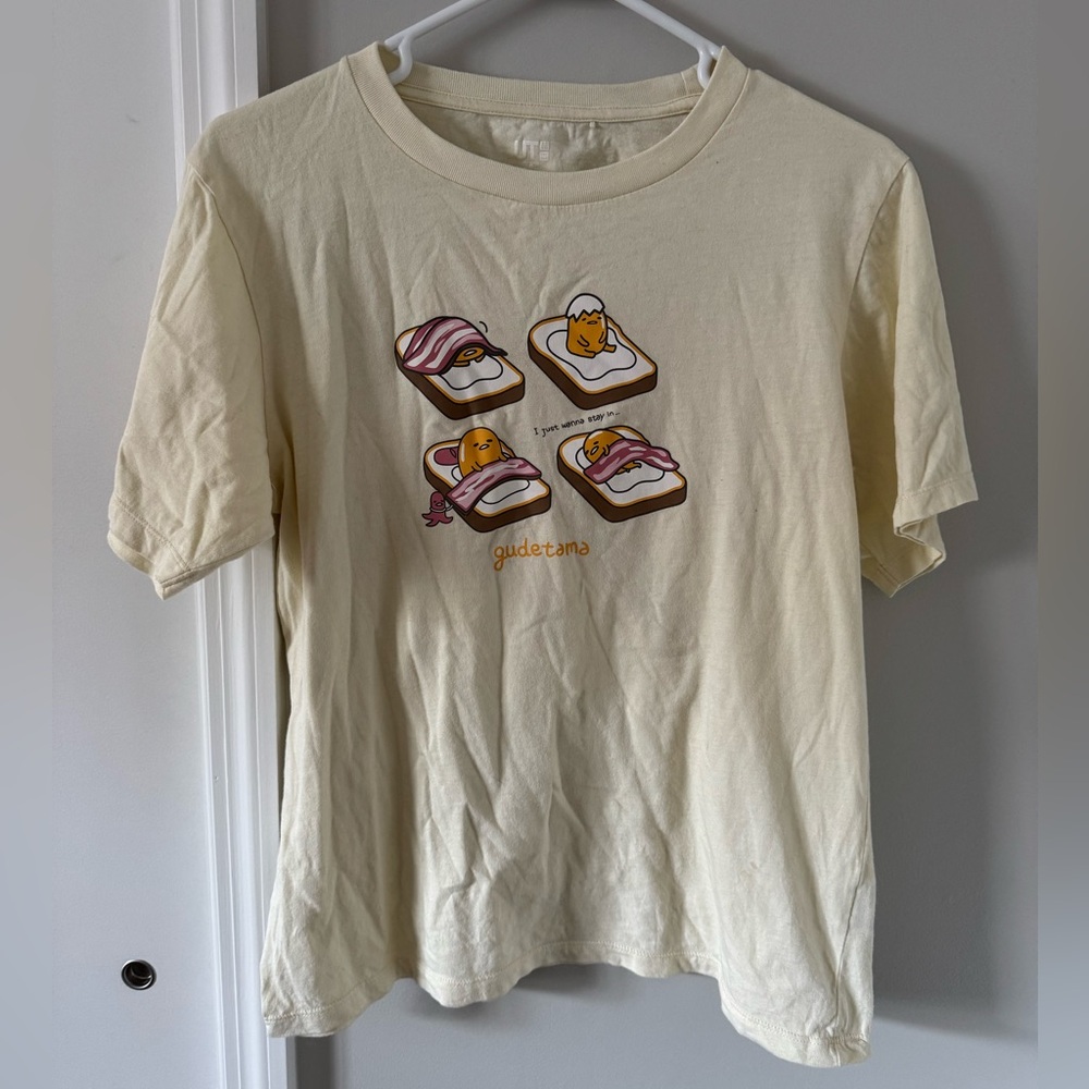 EUC Uniqlo Gudetama Graphic T-Shirt in Cream Yellow